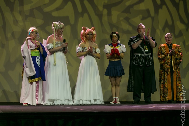 Cosplayers receiving awards at the Anime USA 2013 Cosplay Masquerade.